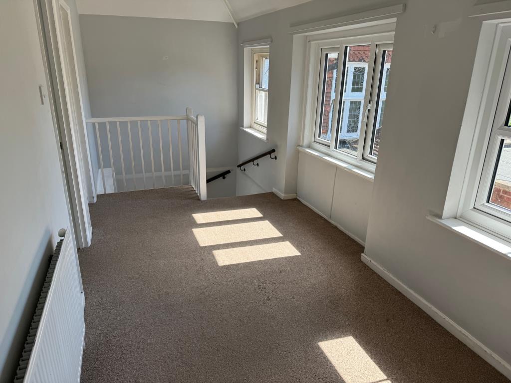 Lot: 74 - HEAD LEASEHOLD INVESTMENT - BLOCK OF FIVE FLATS, THREE-BEDROOM COTTAGE AND THREE GARAGES - The Cottage - First floor landing